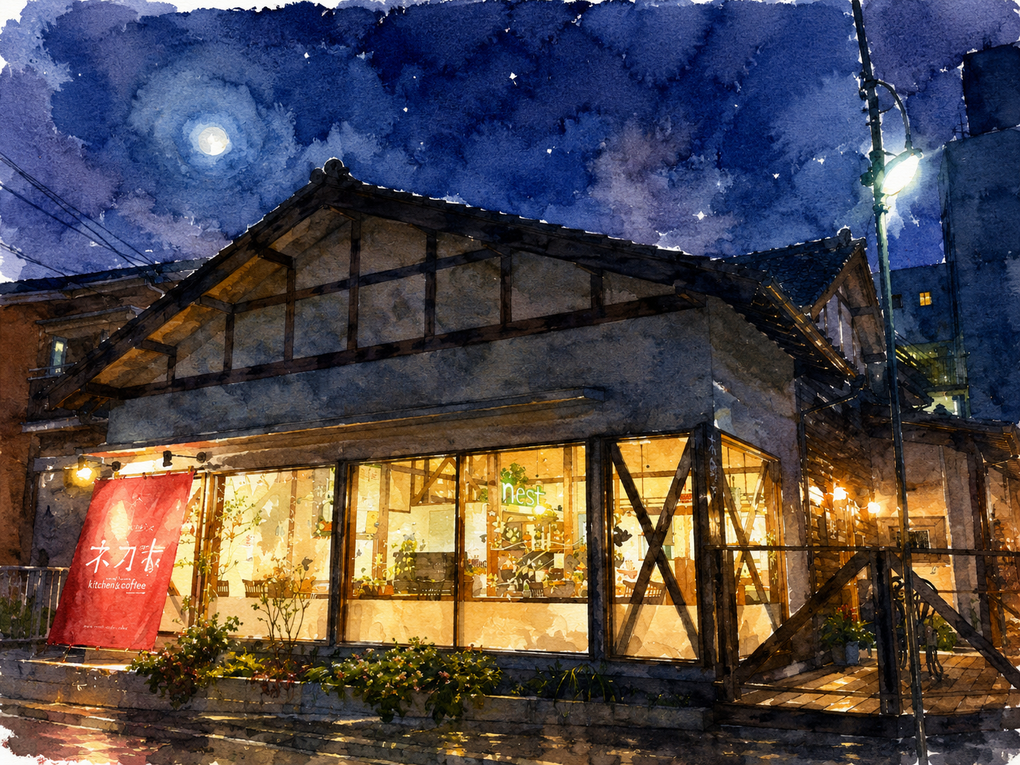 夜、あたたかな灯りがともる木町家の外観