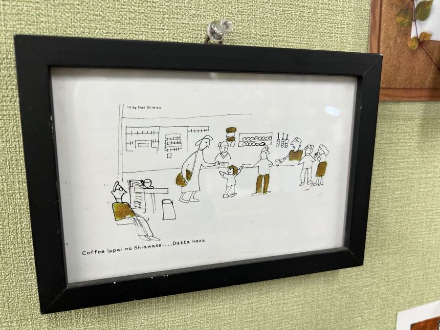 額装されたカフェの線画